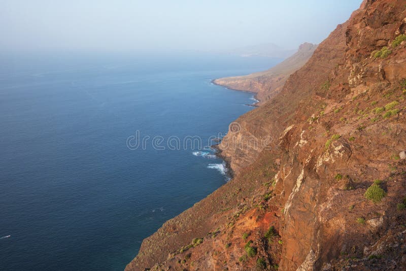 Scenic volcanic coastline landscape, Cliffs in Tamadaba natural park, Grand Canary island, Spain. royalty free stock photo Scenic volcanic coastline landscape, Cliffs in Tamadaba natural park, Grand Canary island, Spain. royalty free stock photo