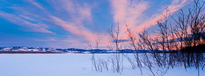 Scenic winter at frozen Lake Laberge Yukon Canada