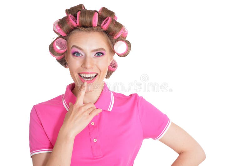 Sch?nheit mit Haarlockenwicklern im Studio stockfotografie Sch?nheit mit Haarlockenwicklern im Studio stockfotografie