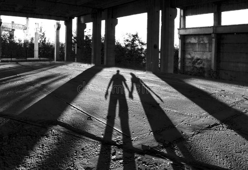 Schaduwen van een man en een vrouw stock fotografie