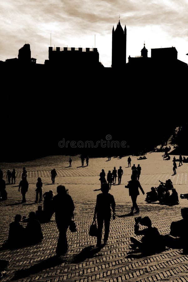 Silhouettes and shadows on the Piazza del Campo in Siena, Italy. Silhouettes and shadows on the Piazza del Campo in Siena, Italy