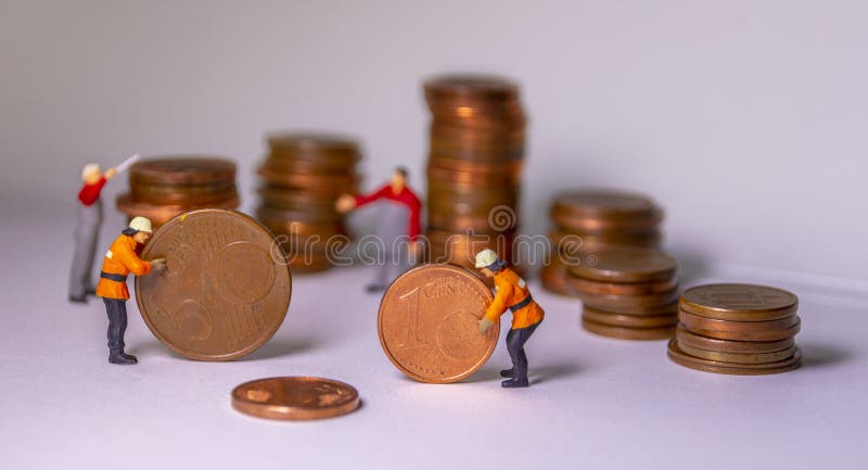 Check stacks of coins. Depository bank clersk concept. Miniature people. Check stacks of coins. Depository bank clersk concept. Miniature people