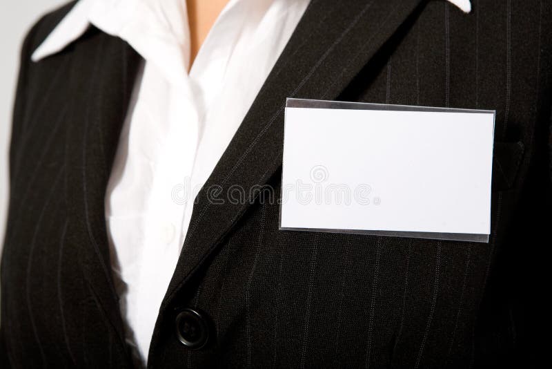 Close up of black suit with id card. Close up of black suit with id card