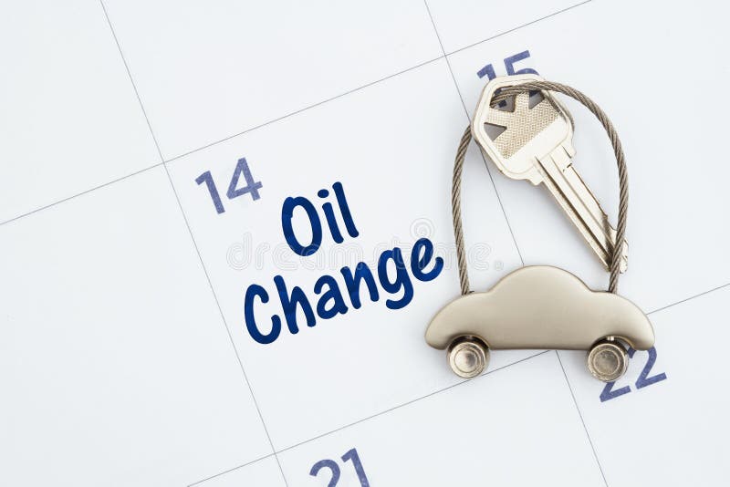 Schedule an Oil Change with Monthly Calendar with Car Keys Stock Photo