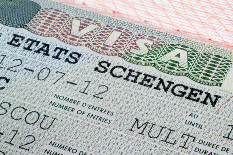 Schengen visa in passport stock image. Image of pattern 3483889