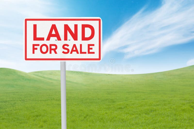 Schild mit Land für Verkaufstext stockbild Schild mit Land für Verkaufstext stockbild