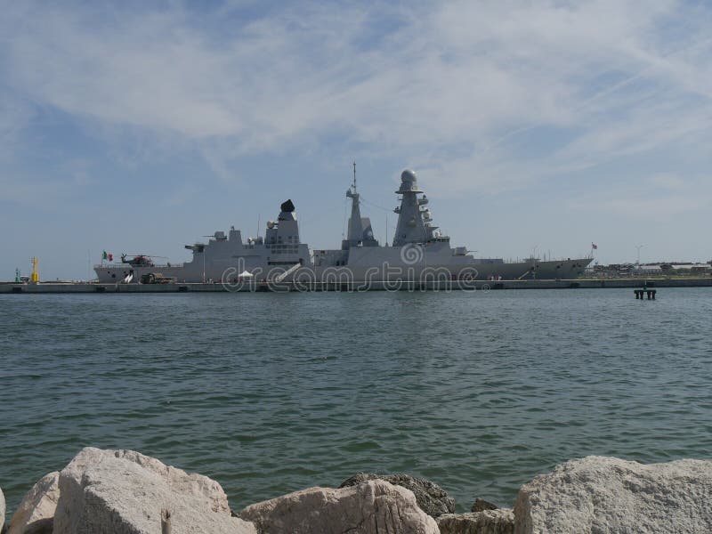 Destroyer ship Andrea Doria of the Italian Navy moored in the port of Ravennan. Destroyer ship Andrea Doria of the Italian Navy moored in the port of Ravennan