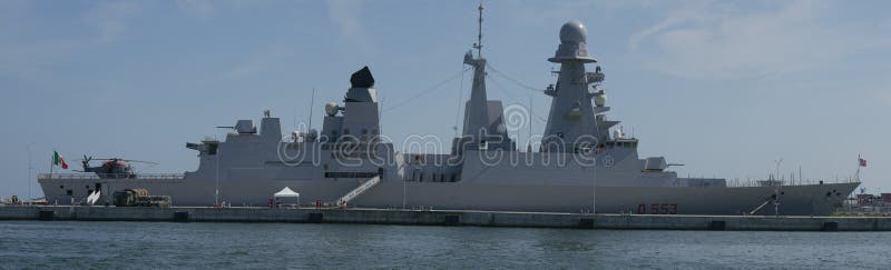 Destroyer ship Andrea Doria of the Italian Navy moored in the port of Ravennan. Destroyer ship Andrea Doria of the Italian Navy moored in the port of Ravennan