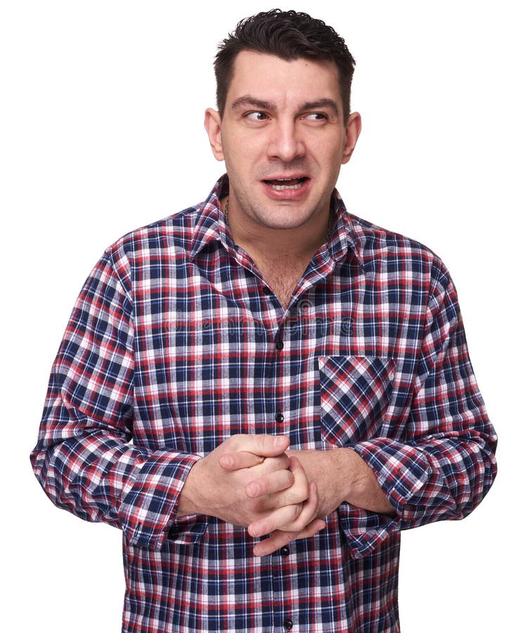Schlauer junger Mann im karierten Hemd lizenzfreie stockfotografie Schlauer junger Mann im karierten Hemd lizenzfreie stockfotografie