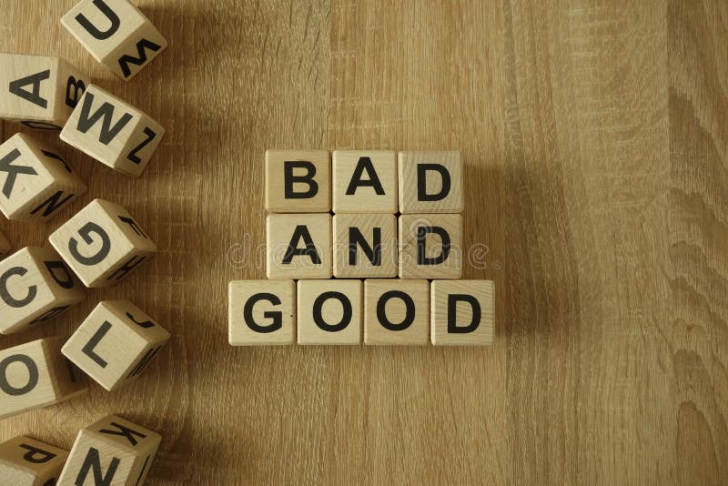 Schlechter und guter Text von den Holzklötzen lizenzfreies stockbild Schlechter und guter Text von den Holzklötzen lizenzfreies stockbild
