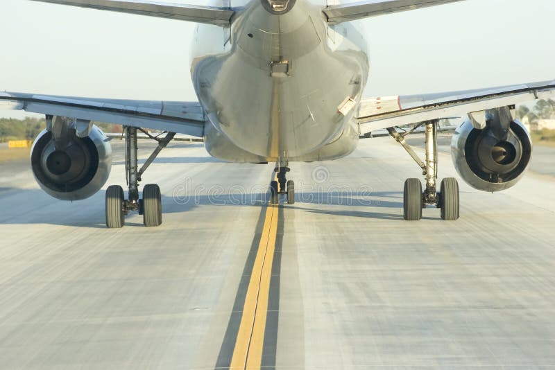 Close up view behind a jumbo jet. Close up view behind a jumbo jet