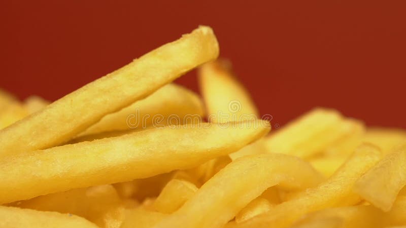 Schließen Sie oben von den Pommes-Frites, ungesunde fetthaltige Nahrung mit großer Menge Kalorien