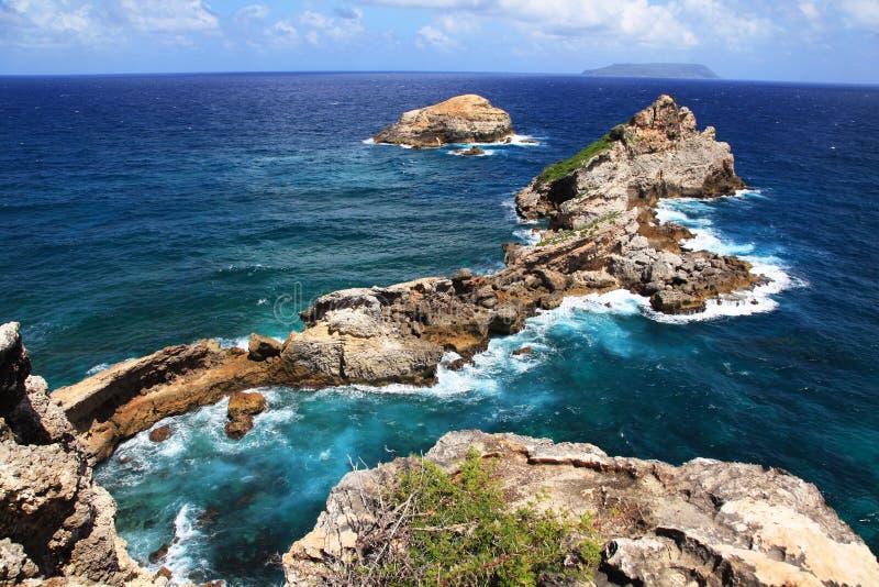 View to the Pointe des Chateaux (Castle Point) in Guadeloupe, French overseas. View to the Pointe des Chateaux (Castle Point) in Guadeloupe, French overseas