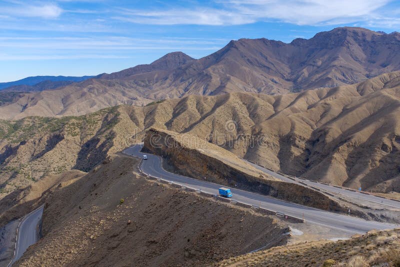Narrow road curving and climbing its way over the Atlas mountain range in central Morocco. Narrow road curving and climbing its way over the Atlas mountain range in central Morocco.