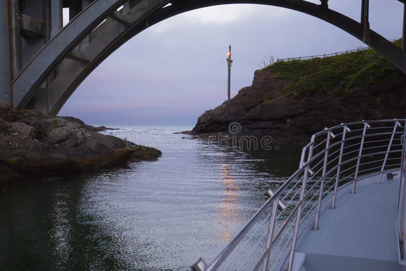 Narrow passage out of Depoe Bay, Oregon into the Pacific ocean. Narrow passage out of Depoe Bay, Oregon into the Pacific ocean.