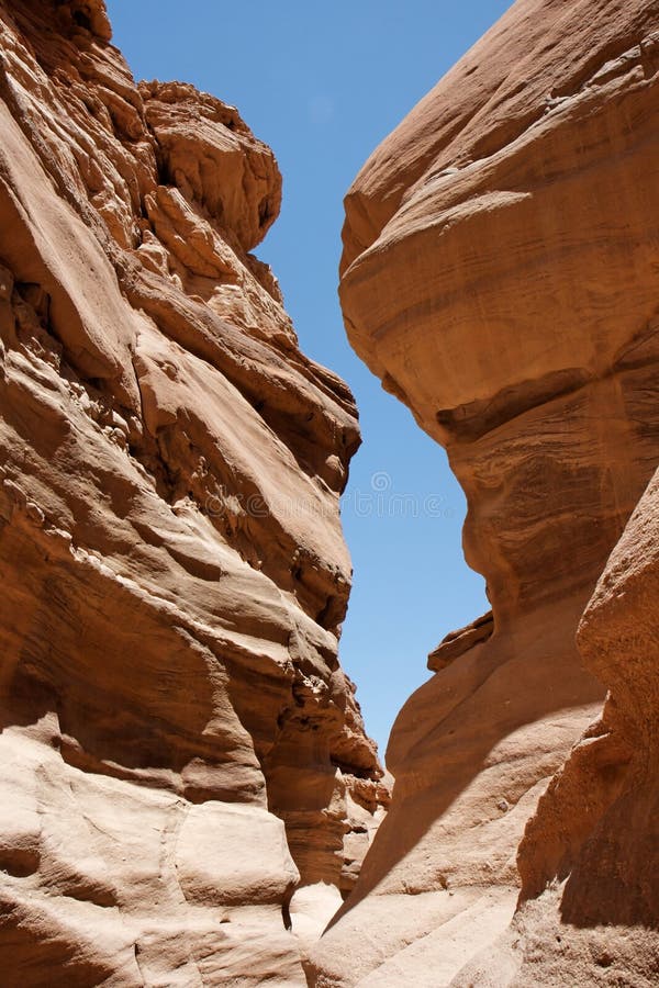 Narrow slot between two rocks in Red Canyon, Israel. Narrow slot between two rocks in Red Canyon, Israel