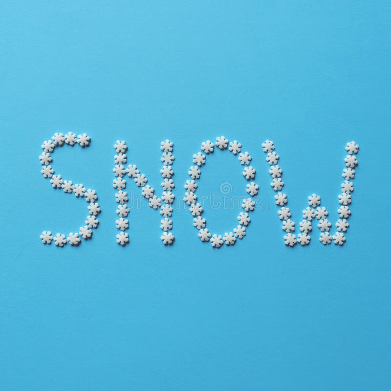 SNOW made of sugar snowflakes - Trendy flat lay design - Christamas and New Year concepts. SNOW made of sugar snowflakes - Trendy flat lay design - Christamas and New Year concepts