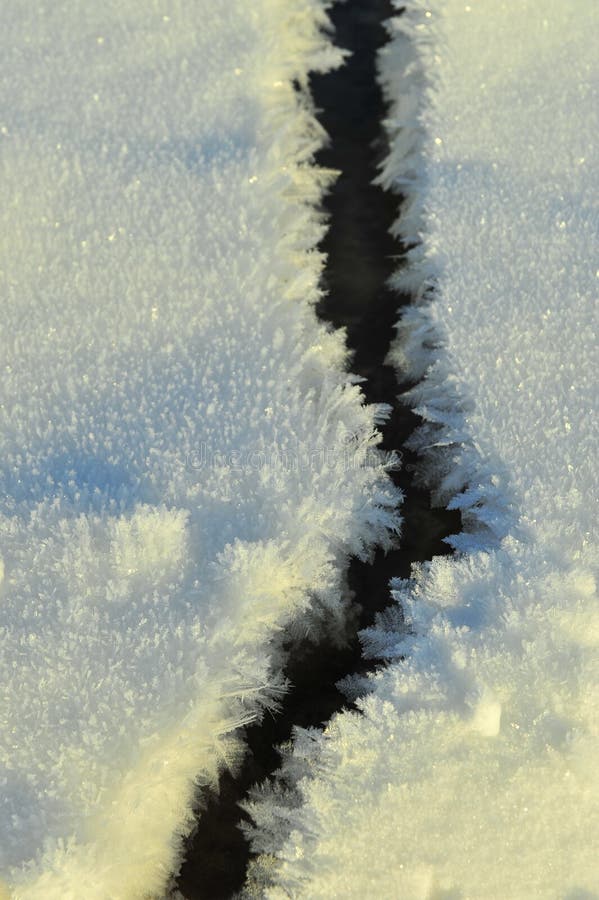 Snow patterns on ice of Ladoga lake. Winter. Leningrad region. Russia. Snow patterns on ice of Ladoga lake. Winter. Leningrad region. Russia.