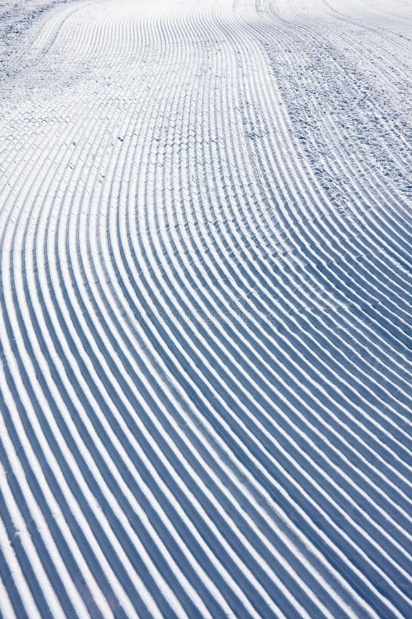 Snow pattern made by snowplow on a ski slope. Snow pattern made by snowplow on a ski slope