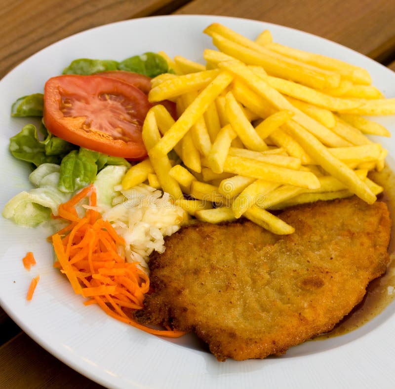 Schnitzel - cutlet with french fries and Salad