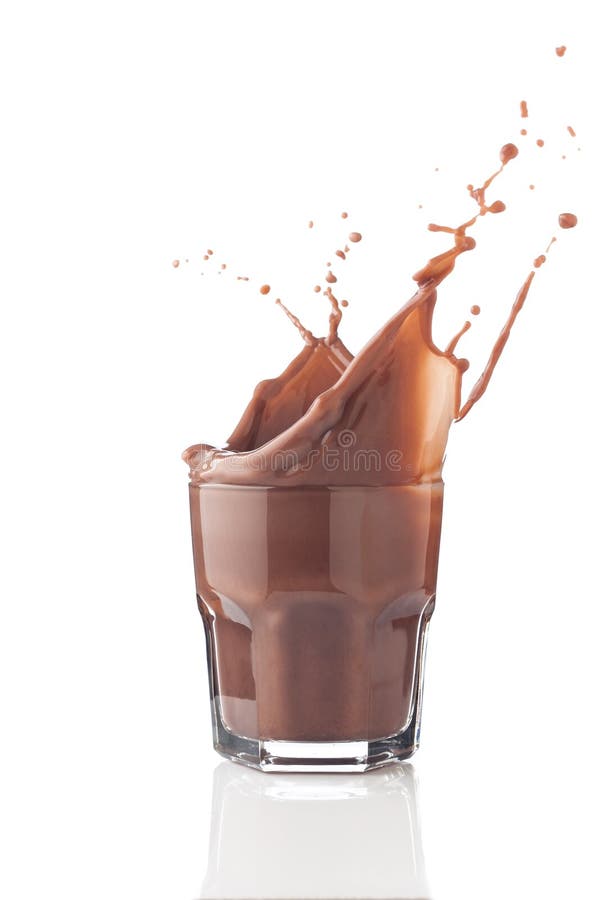 Schokoladenspritzen in einem Glas lizenzfreies stockfoto Schokoladenspritzen in einem Glas lizenzfreies stockfoto