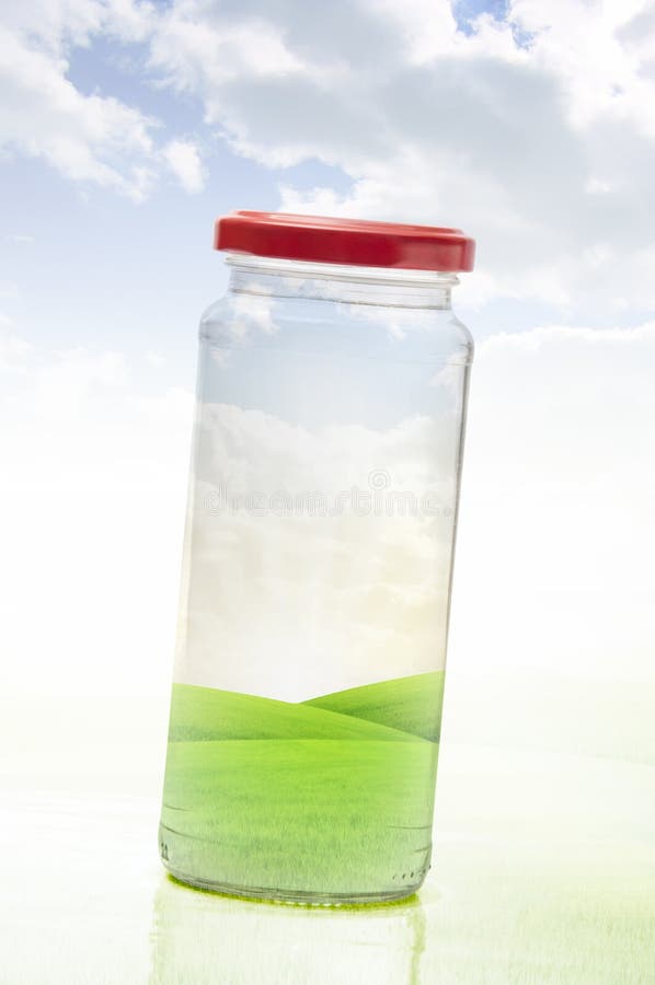 Clean Fresh Nature Preserved in A Glass Jar (Nature Protection Against Pollution Concept). Clean Fresh Nature Preserved in A Glass Jar (Nature Protection Against Pollution Concept)
