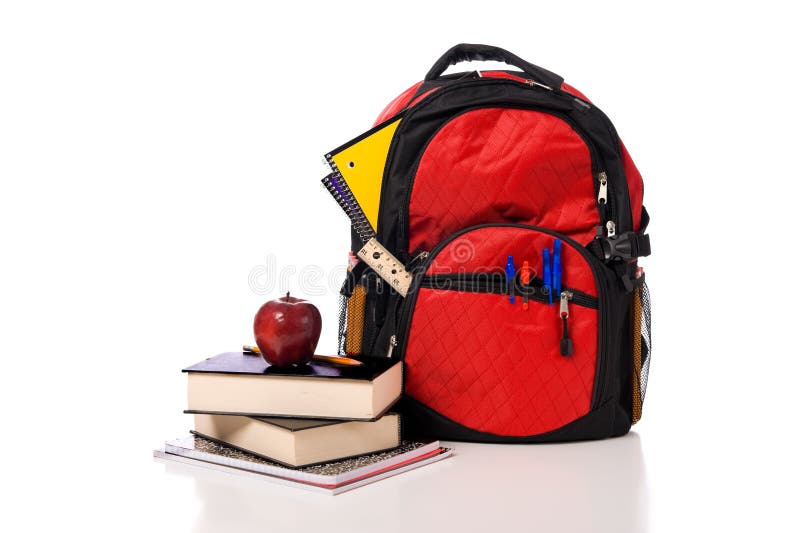 School Backpack Overflowing with supplies royalty free stock photography