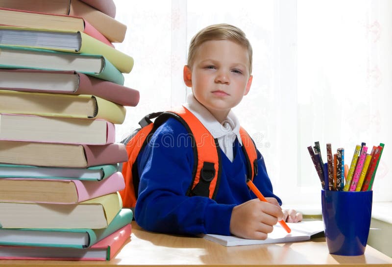 School Boy Sitting At The Desk Stock Photography Image 15786572