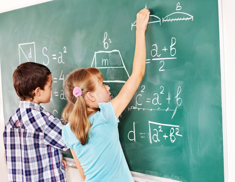 School child writting on blackboard. royalty free stock photo School child writting on blackboard. royalty free stock photo