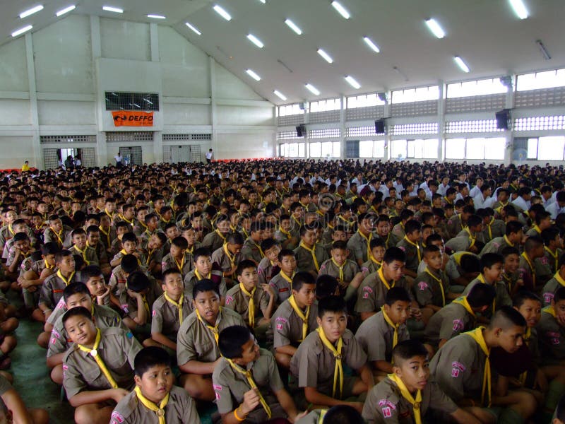School children sit at assembly, Thailand. stock photos School children sit at assembly, Thailand. stock photos