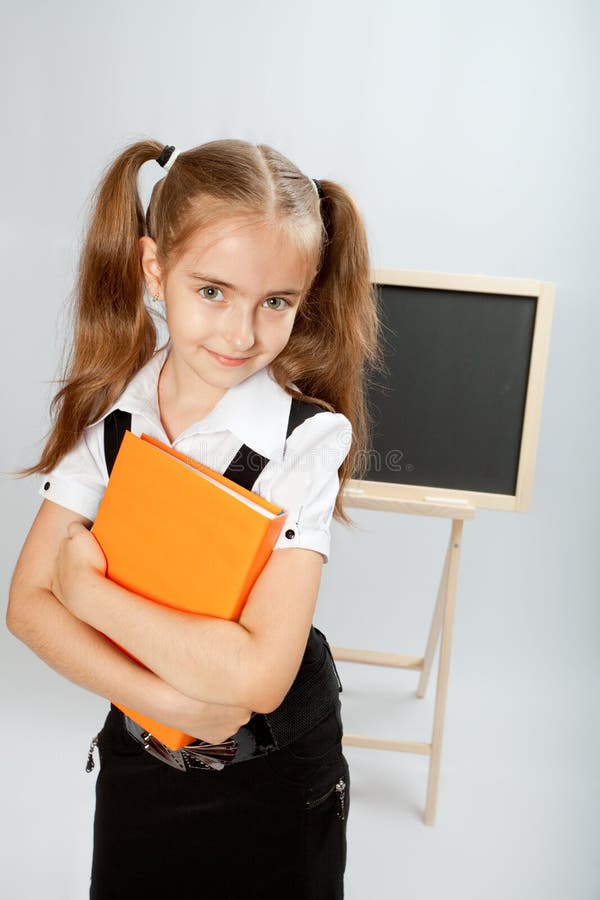 School girl with yellow book