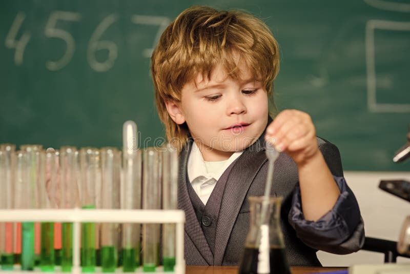 School Kid Scientist Studying Science. Science Experiments with