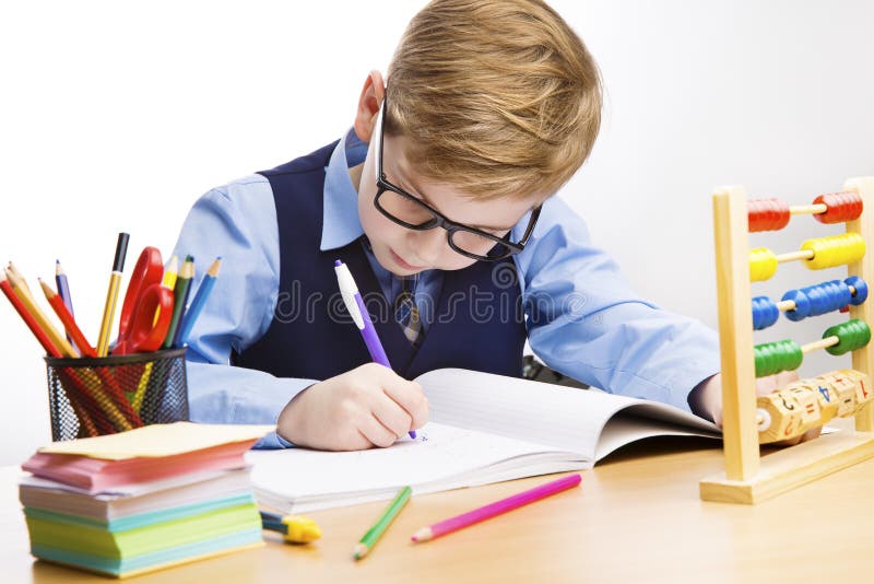 School Kid Writing, Student Child Learn in Classroom, Young Boy in stock image School Kid Writing, Student Child Learn in Classroom, Young Boy in stock image