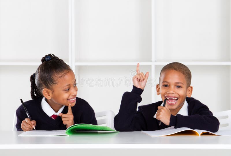 Cute elementary school kids in classroom