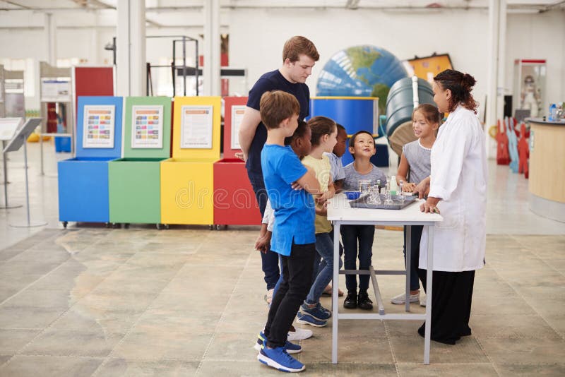 School Kids Watching a Presentation at a Science Centre Stock Photo