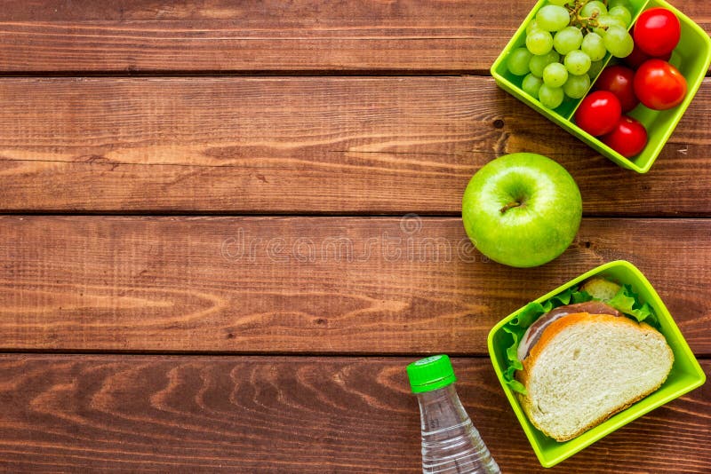 School Lunch Set With Apple And Vegetables In Lunchbox Background Top