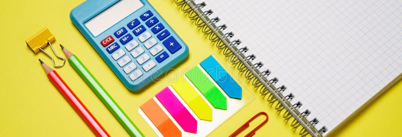 School notebook and various stationery. Back to school concept. Pencils pens royalty free stock image