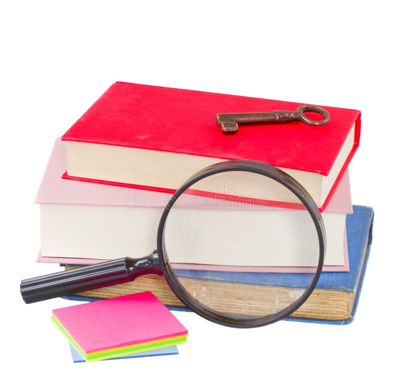 School stationery and looking glass royalty free stock photo