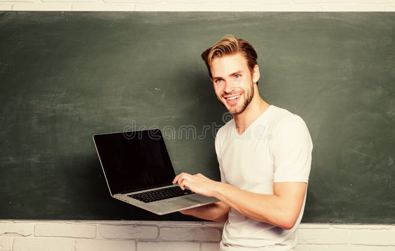 School teacher programming with laptop. Student learn programming language. Programming web development. Digital technology. Apply online course for programmers. Handsome man use modern technology.