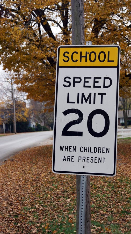 School Zone Sign in Fall stock photography