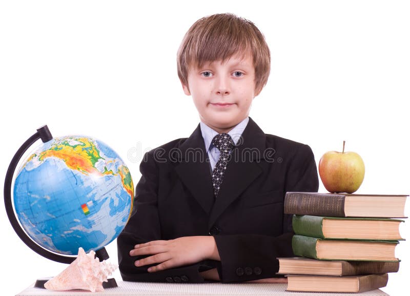 Schoolboy with books, globe and apple