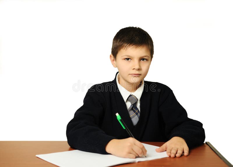 The schoolboy does a homework royalty free stock images