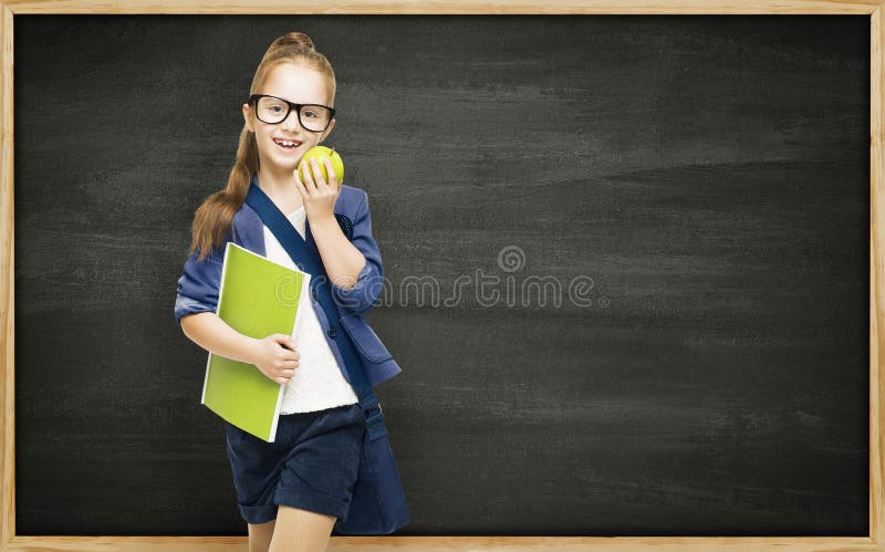 Schoolgirl with book apple and blackboard, school girl child on