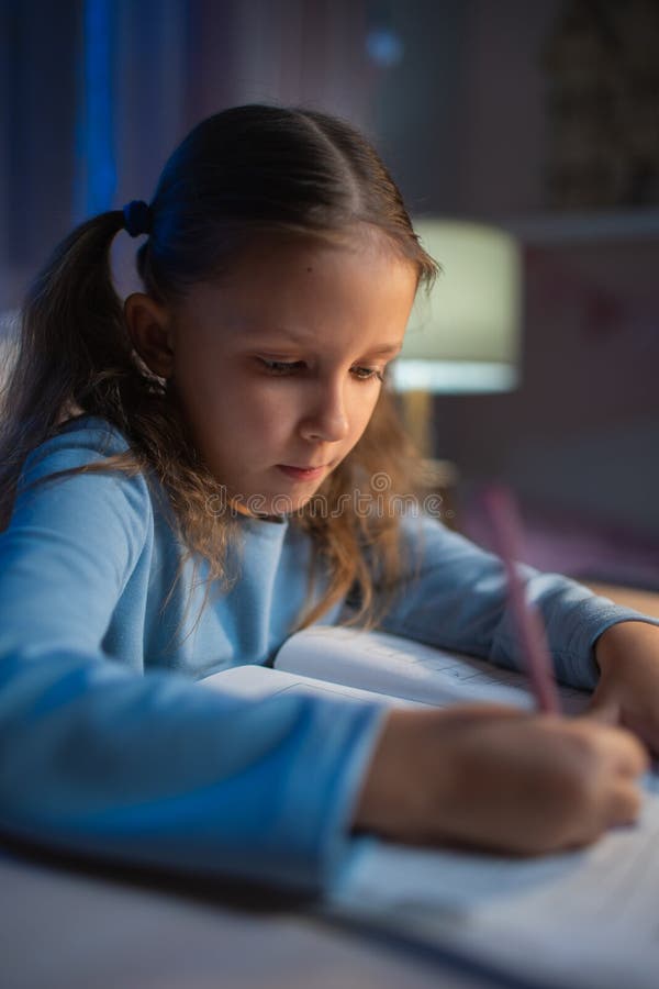 she does her homework in the evening