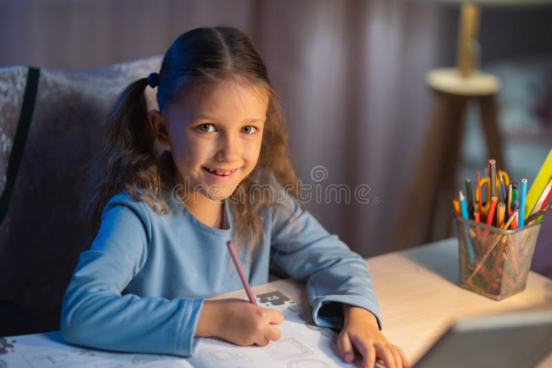 she does her homework in the evening