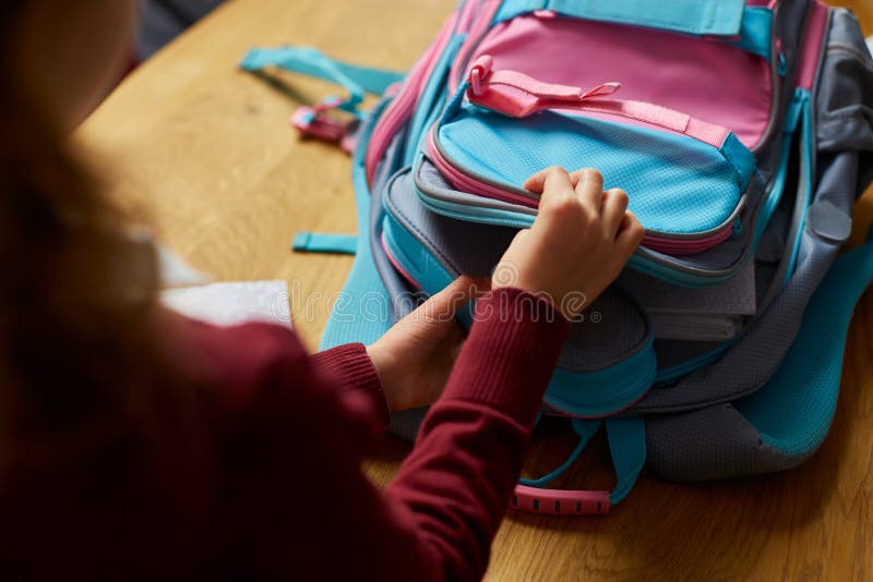 Schoolgirl Put Books And Notes Into Backpack At Home Pupil Prepare schoolgirl-put-books-and-notes-into-backpack-at-home-pupil-prepare