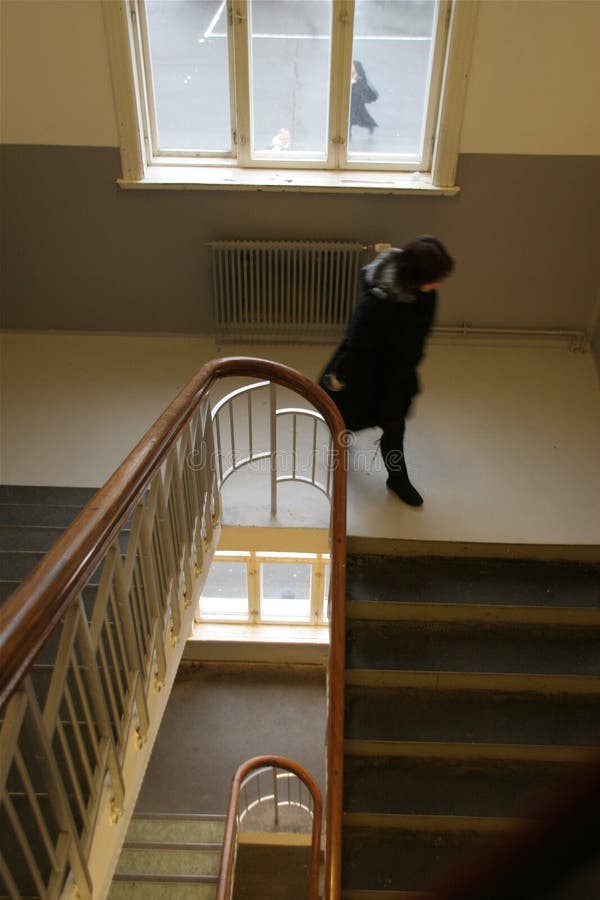 Schoolgirl in staircase