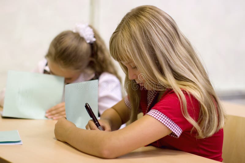 Schoolgirls writing