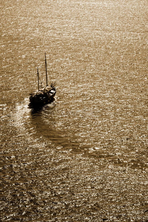 Schooner making turn in Adriatic Sea near Dubrovnik, Croatia. Toned image