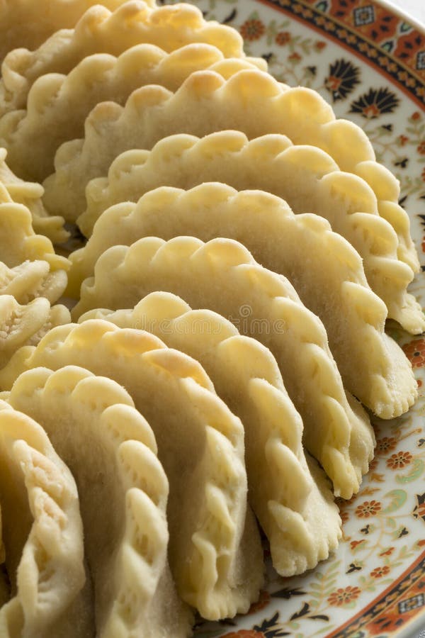 Dish with traditional festive Gazelle Horns cookies close up. Dish with traditional festive Gazelle Horns cookies close up